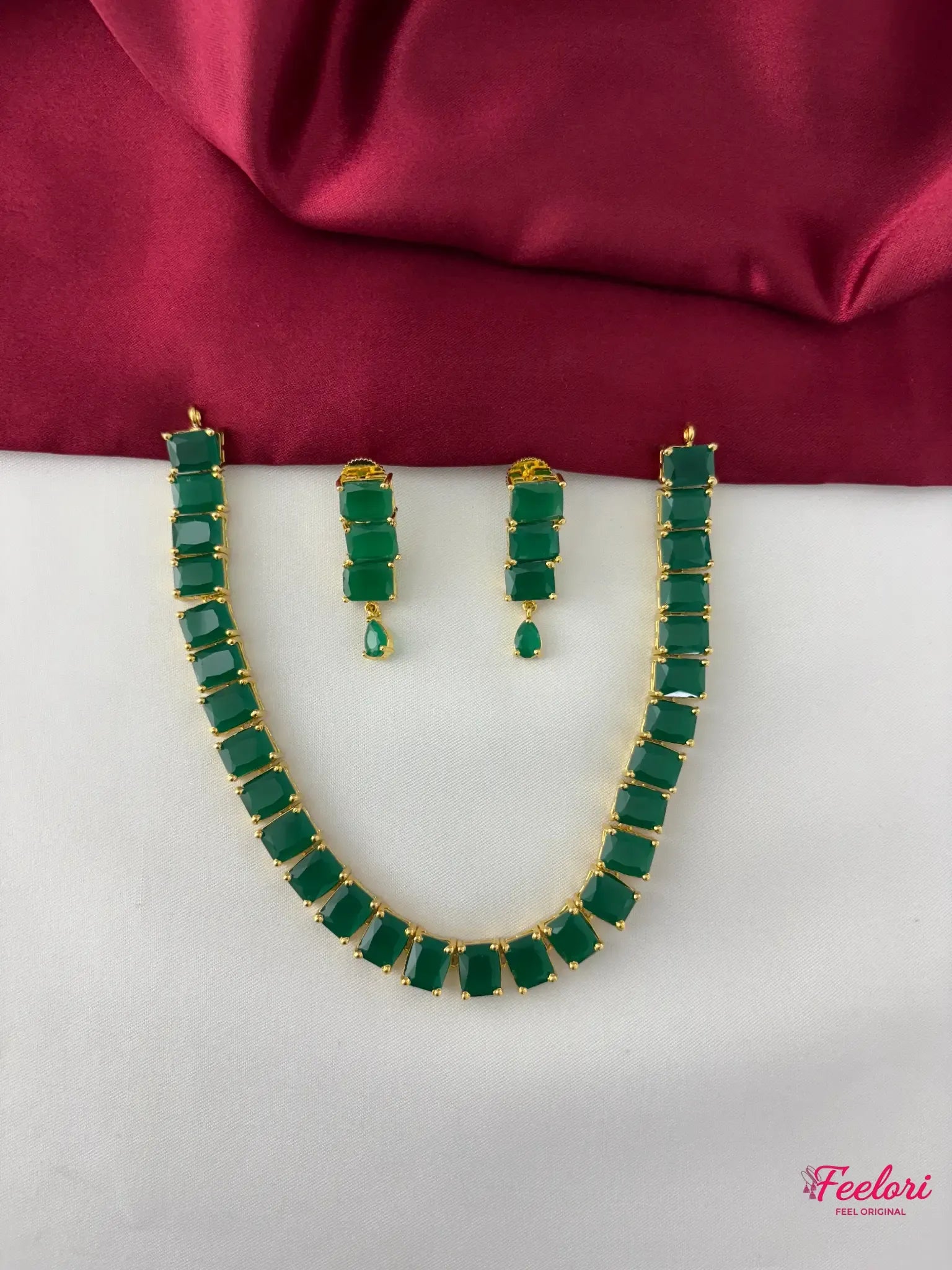 FeelOri Gold Plated Emerald Rectangle-Cut Necklace Set - Full front view showcasing the unique bezel-set rectangular green stones.