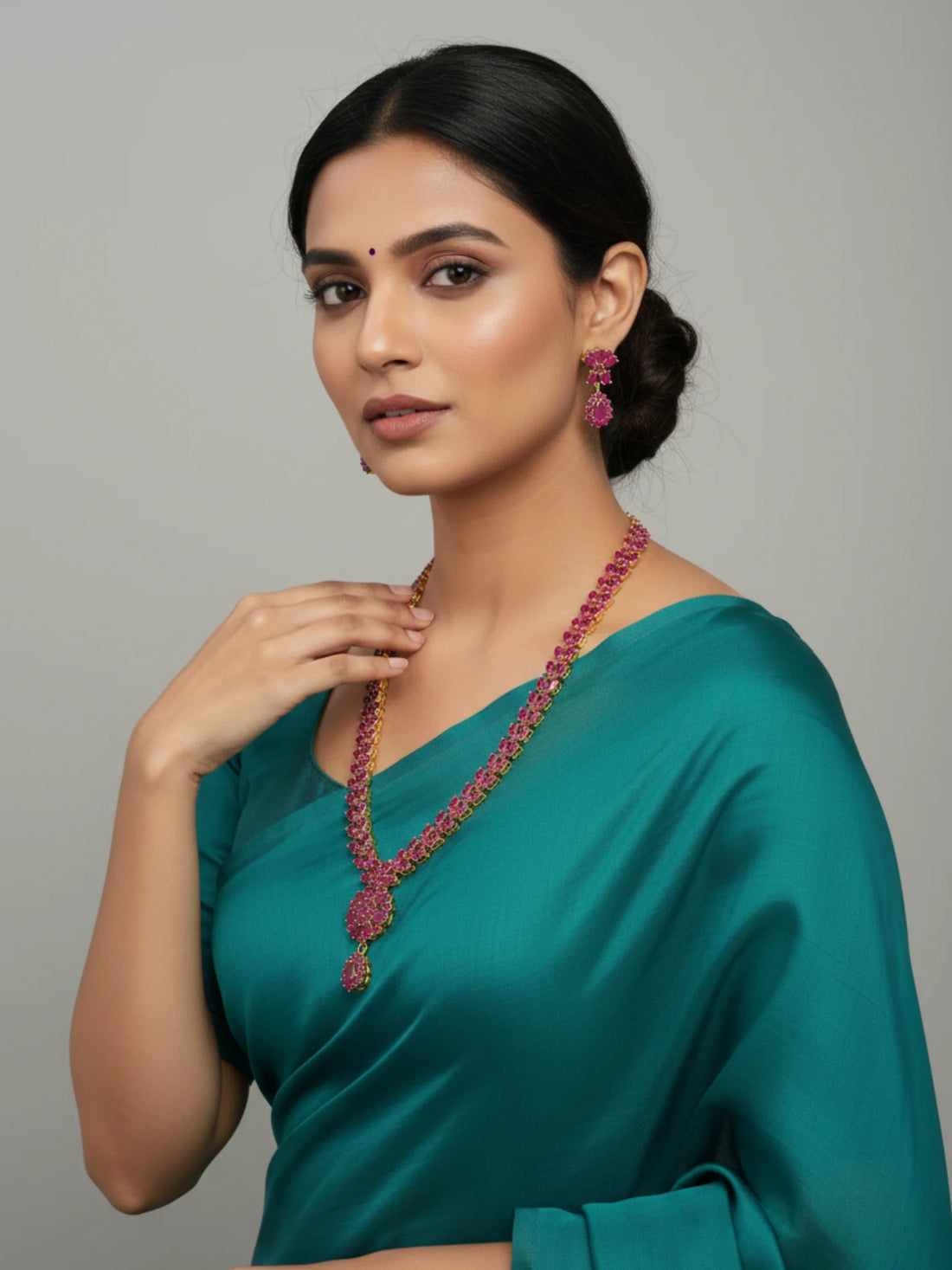 FeelOri Gold Plated Ruby Drop Necklace & Earring Set - Model wearing the elegant set with a teal saree.