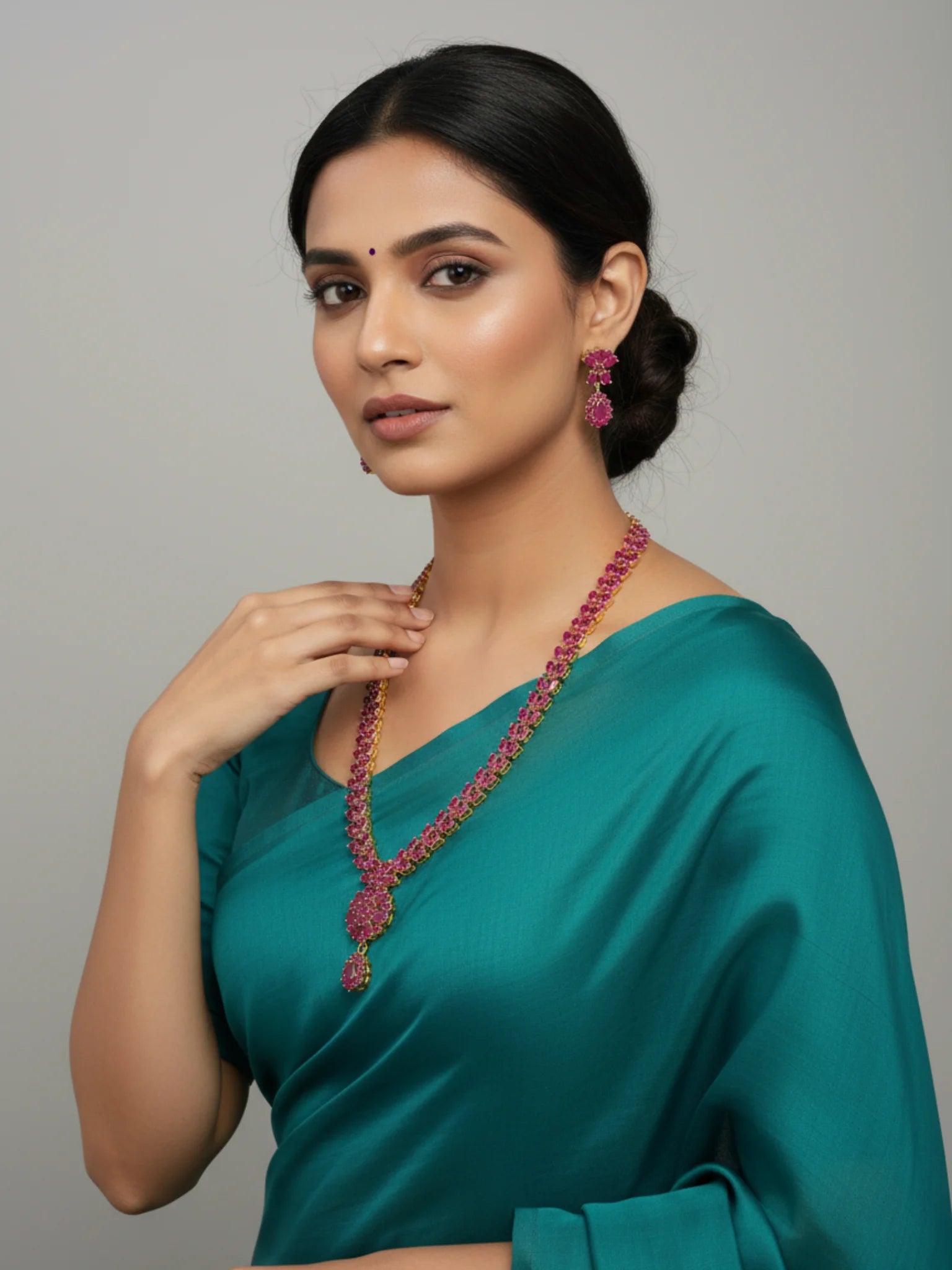 FeelOri Gold Plated Ruby Drop Necklace & Earring Set - Model wearing the elegant set with a teal saree.