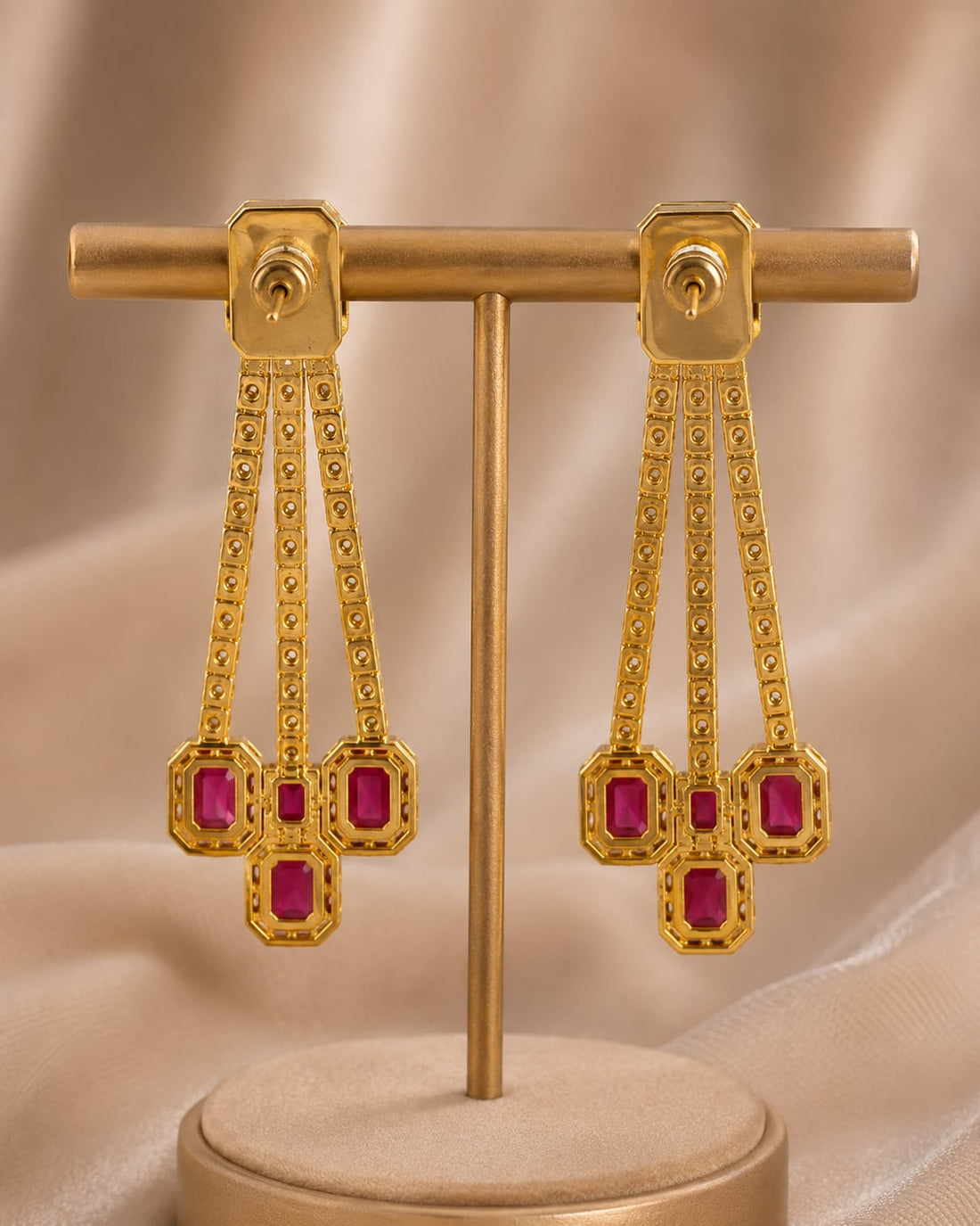 Rear view of FeelOri gold-plated ruby linear CZ hanging earrings showing push-back closures