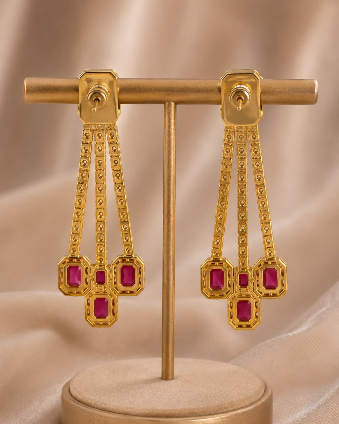 Rear view of FeelOri gold-plated ruby linear CZ hanging earrings showing push-back closures