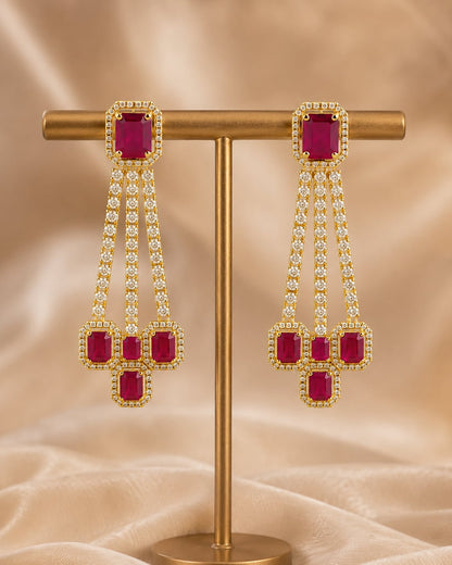 FeelOri gold-plated ruby linear CZ hanging earrings displayed as a matching pair