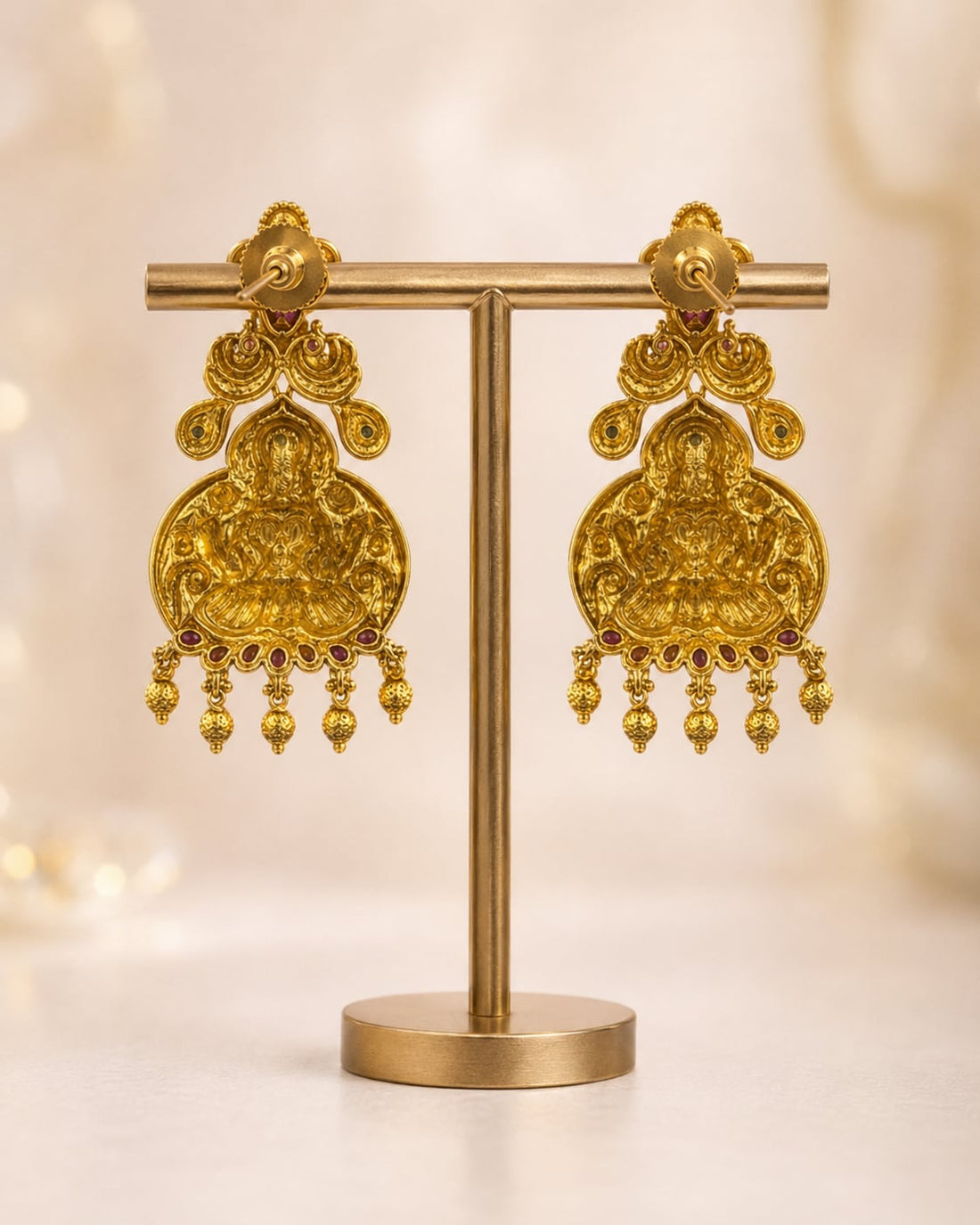 FeelOri gold-plated ruby and emerald earrings rear view showing openwork reverse, straight posts, and push-back closures
