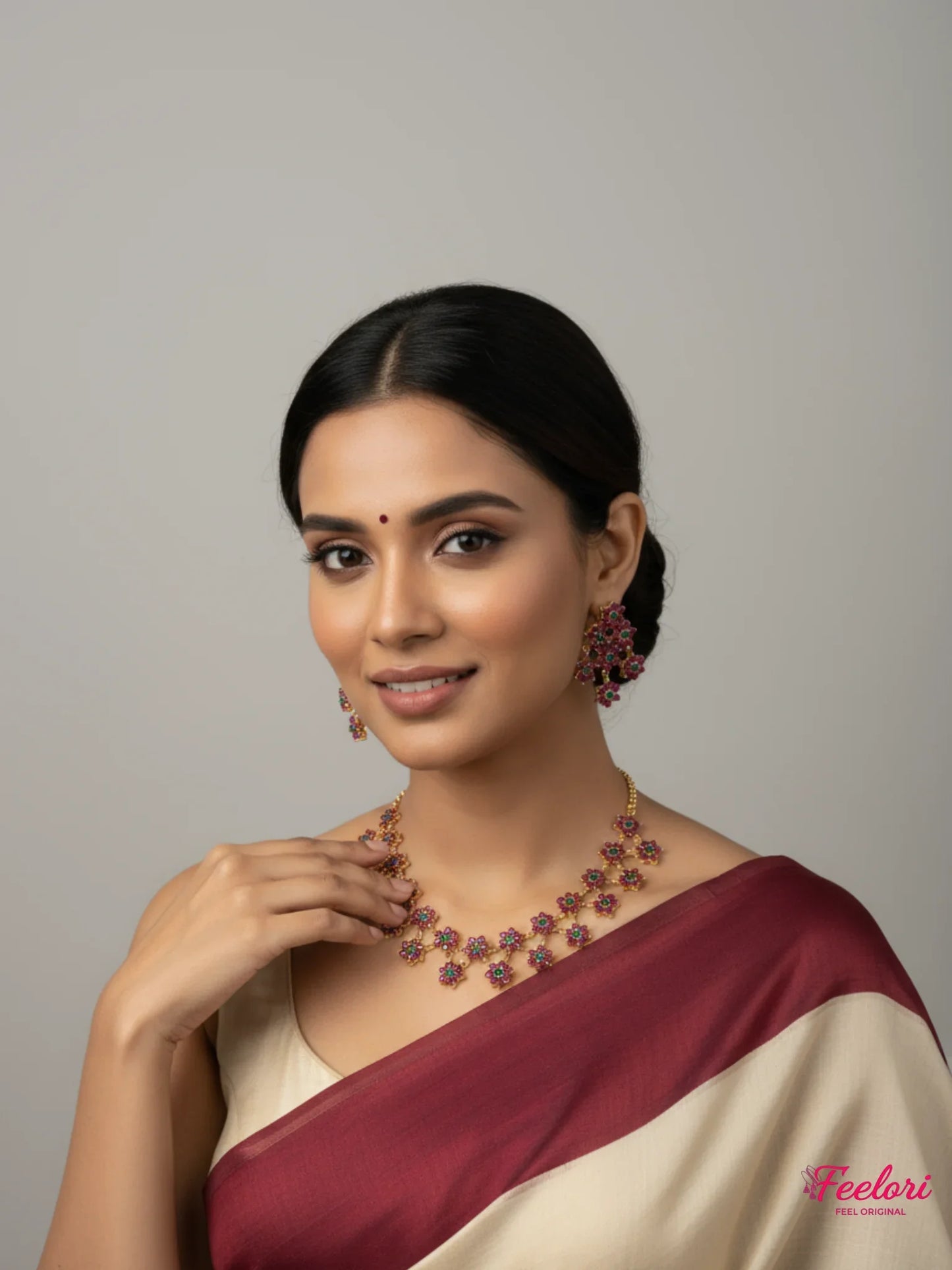 FeelOri Gold Plated Floral Ruby Emerald Necklace Set - Model wearing bloom design with traditional saree