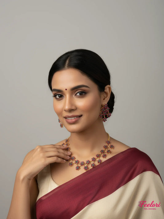FeelOri Gold Plated Floral Ruby Emerald Necklace Set - Model wearing bloom design with traditional saree