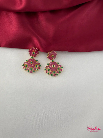 FeelOri Gold Plated Ruby Emerald Petal Earrings - Close-up view highlighting the intricate floral pattern and rich gemstone colors.