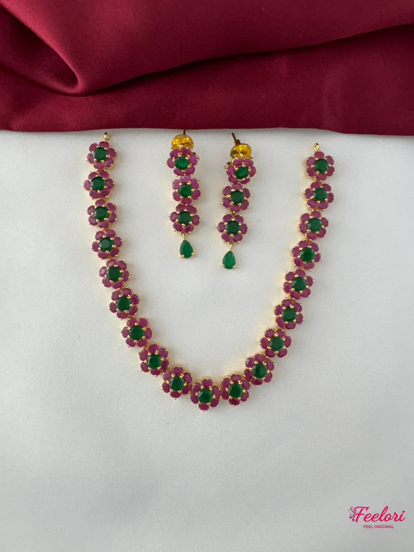 FeelOri Gold Plated Ruby Emerald Floral Petal Chain Necklace Set - Full view showcasing the necklace and matching earrings with intricate stone arrangement.