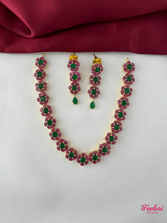 FeelOri Gold Plated Ruby Emerald Floral Petal Chain Necklace Set - Full view showcasing the necklace and matching earrings with intricate stone arrangement.