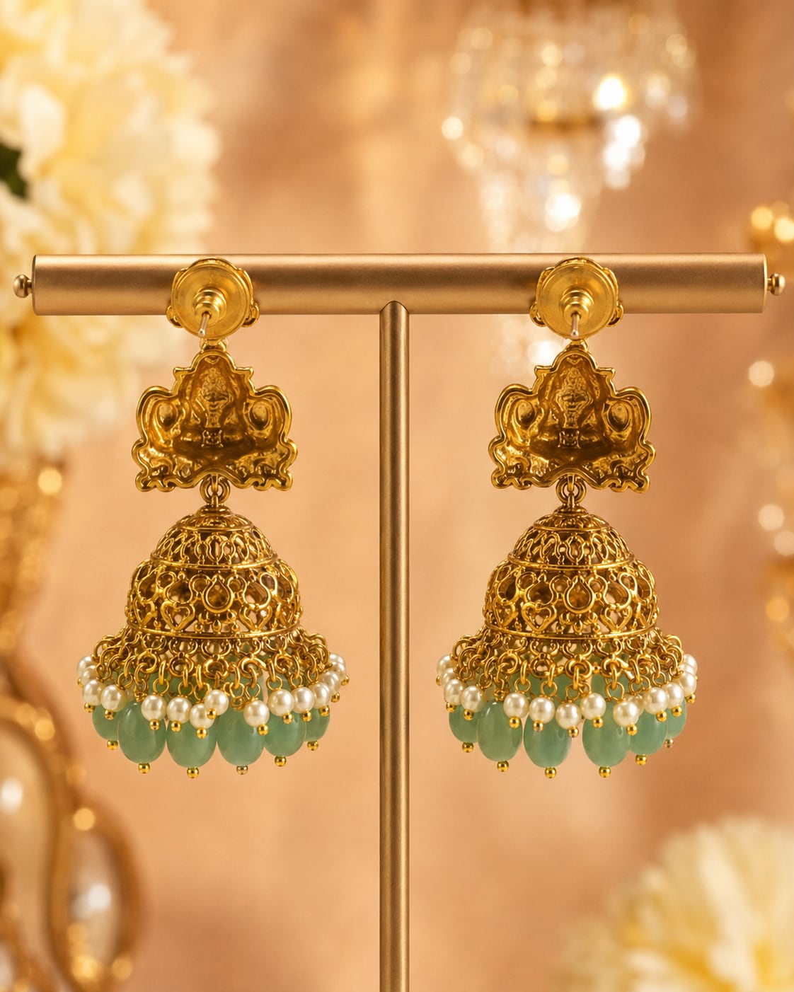 FeelOri gold-plated ruby and emerald jhumka earrings rear view showing openwork reverse, straight posts, and push-back closures