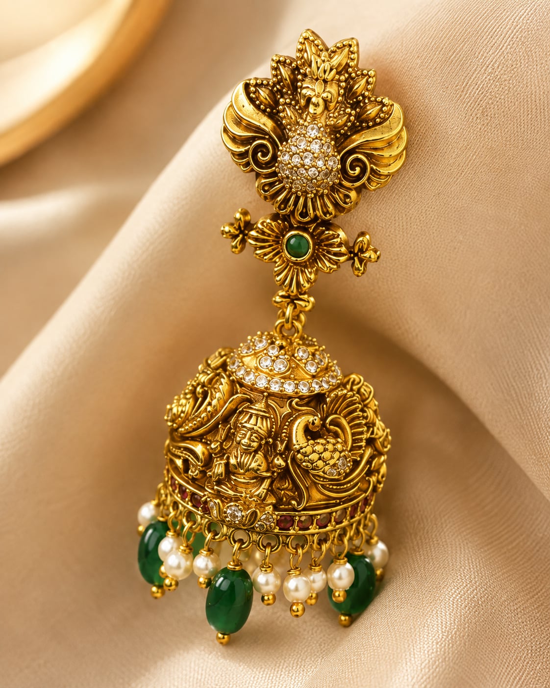 FeelOri gold-plated ruby and emerald jhumka earrings stone setting, ear-chain or earring construction, and gold-plated finish detail