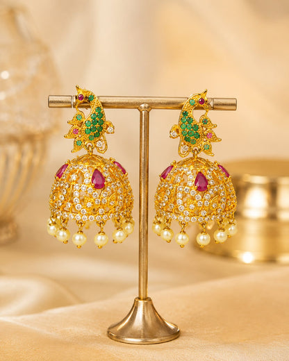 Front view of one matching pair of FeelOri gold-plated ruby emerald floral CZ jhumka earrings