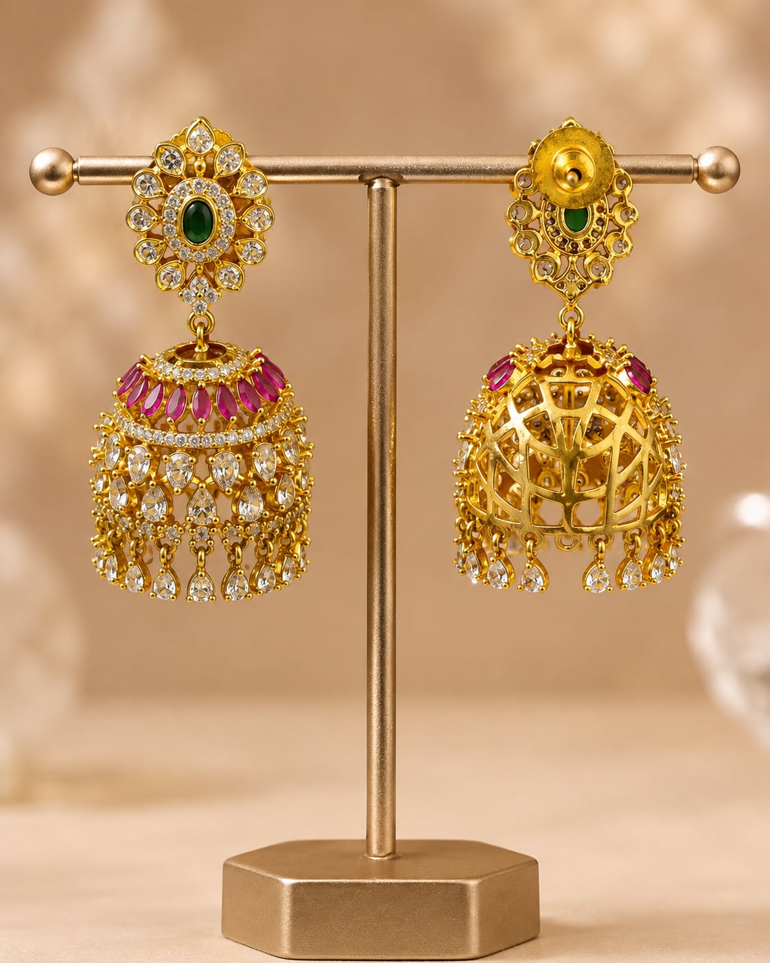 Front view of one matching pair of FeelOri gold-plated ruby emerald floral-dome CZ jhumka earrings