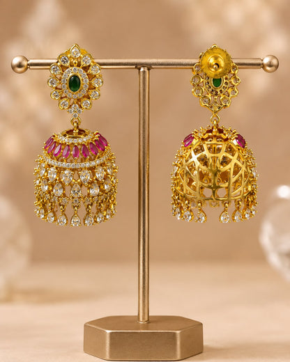 Front view of one matching pair of FeelOri gold-plated ruby emerald floral-dome CZ jhumka earrings