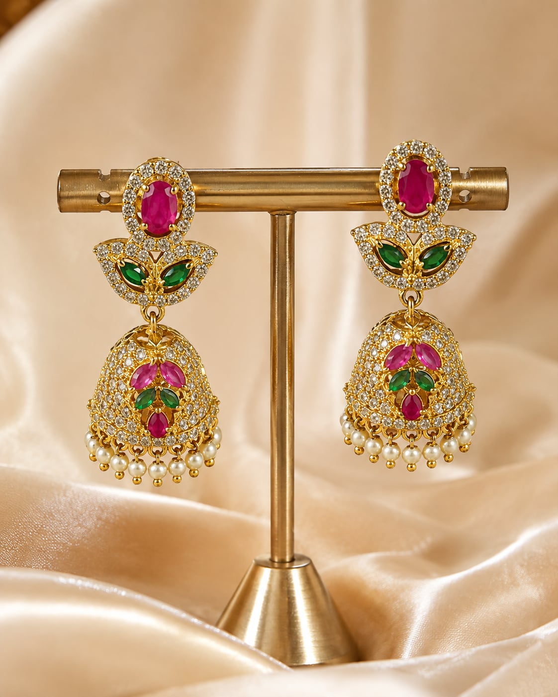 Front view of one matching pair of FeelOri petite gold-plated ruby emerald butterfly CZ jhumka earrings