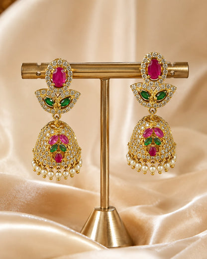 Front view of one matching pair of FeelOri petite gold-plated ruby emerald butterfly CZ jhumka earrings