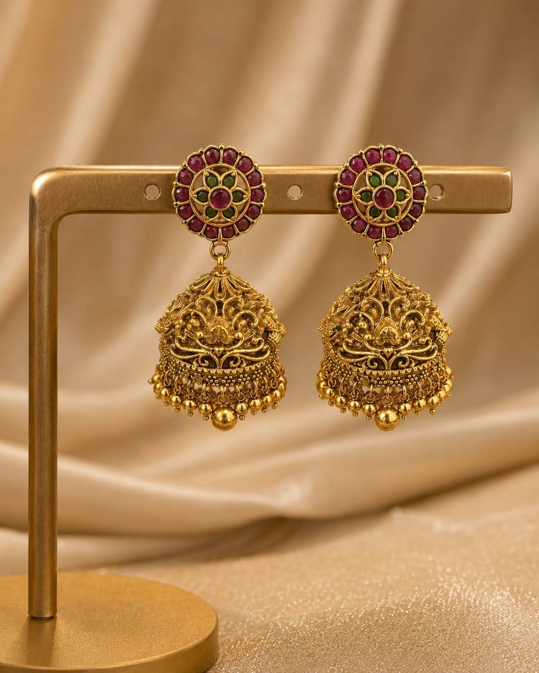 FeelOri gold-plated ruby and emerald jhumka earrings for sarees, kurtas, and festive styling