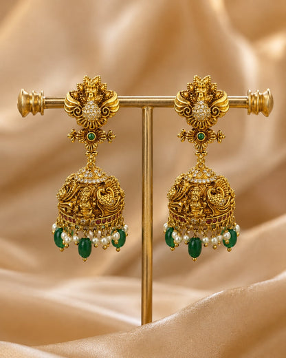 FeelOri gold-plated ruby and emerald jhumka earrings for sarees, kurtas, and festive styling
