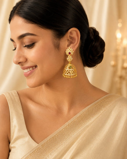 FeelOri ruby emerald CZ jhumka earrings styled on Indian silk textile