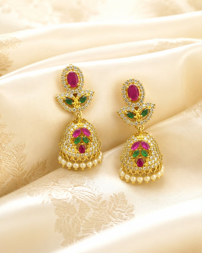 FeelOri petite gold-plated ruby emerald butterfly CZ jhumka earrings styled with saree fabric