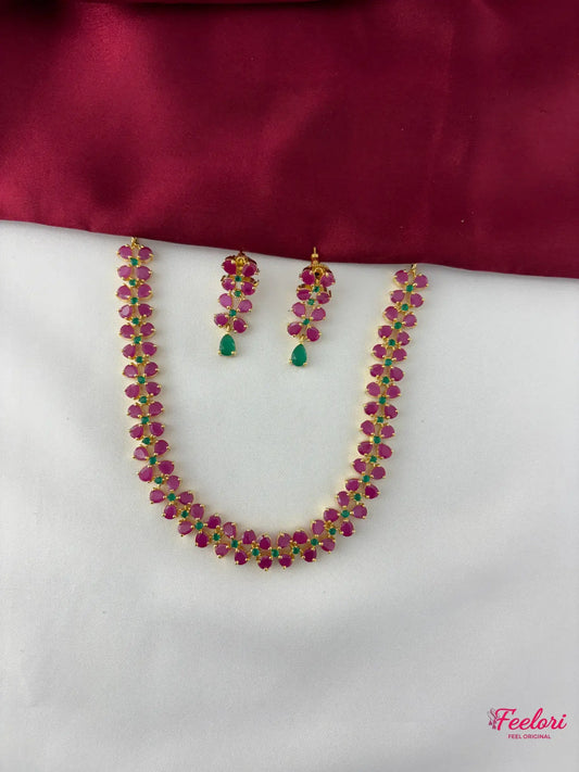 FeelOri Gold Plated Ruby Emerald Leaf Motif Necklace Set - Full view showcasing the necklace with its delicate cluster design and matching earrings.