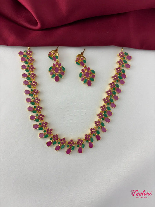 FeelOri Gold Plated Ruby Emerald Petal Necklace Set - Full view showcasing the necklace with its petal-drop design and matching earrings.