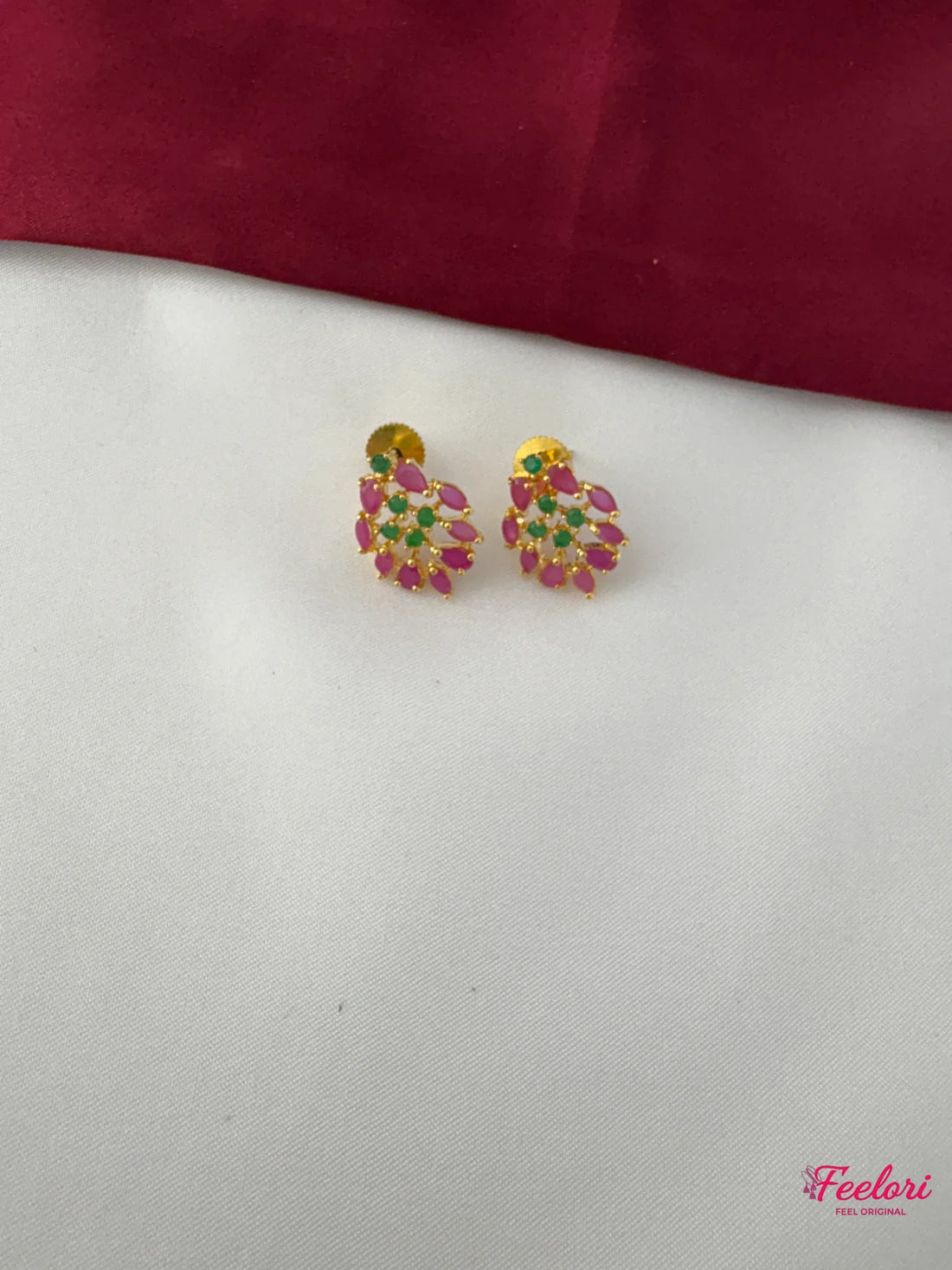 FeelOri Gold Plated Ruby Emerald Tear Drop Earrings - Detailed view highlighting the cluster design and Ruby CZ and emerald stones with push-back closure.