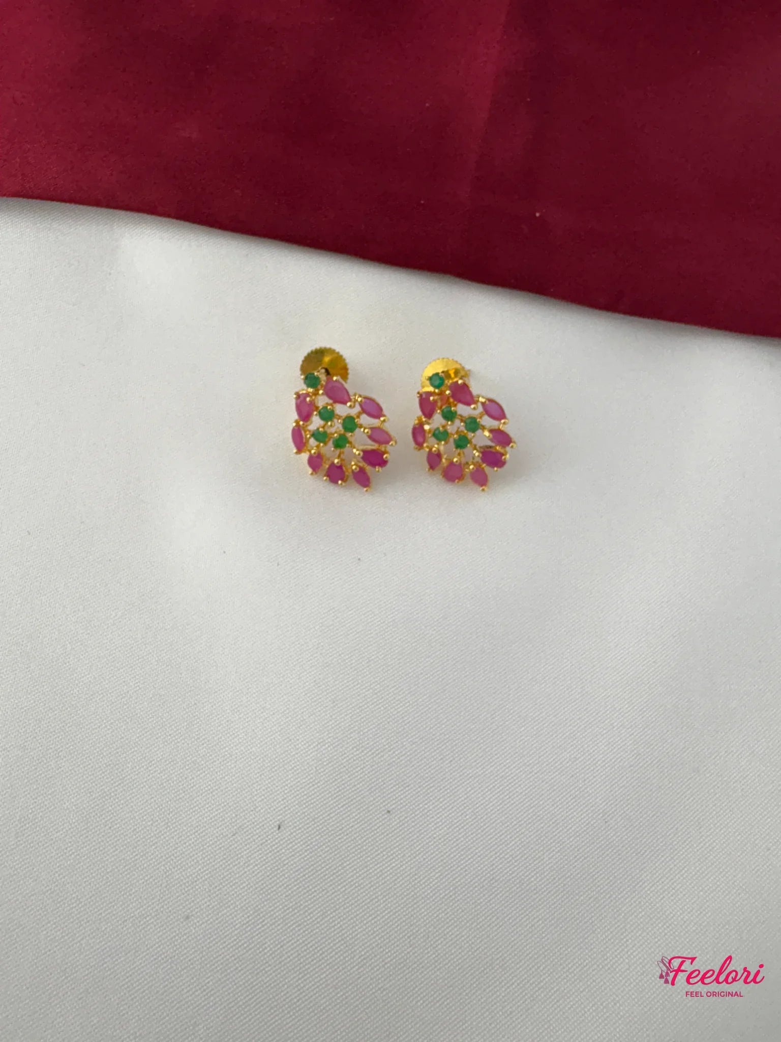 FeelOri Gold Plated Ruby Emerald Tear Drop Earrings - Detailed view highlighting the cluster design and Ruby CZ and emerald stones with push-back closure.