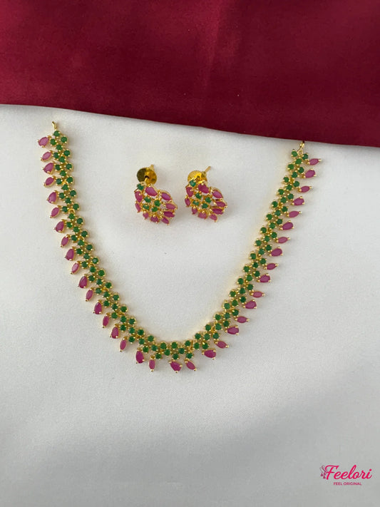 FeelOri Gold Plated Ruby Emerald Tear Drop Necklace Set - Front view showcasing the full length of the necklace and matching earrings with intricate stone placement.