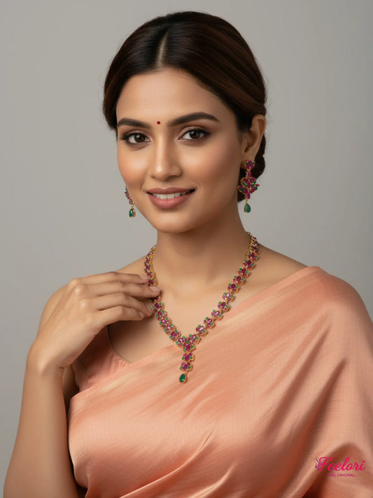 FeelOri Gold Plated Ruby Emerald Necklace Set - Model wearing elegant set with traditional saree.