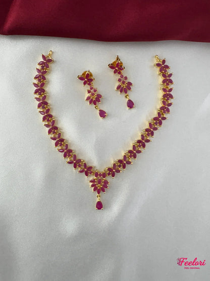 FeelOri Gold Plated Ruby Floral Collar Necklace Set - Front view showcasing the complete set with teardrop pendant and matching earrings.