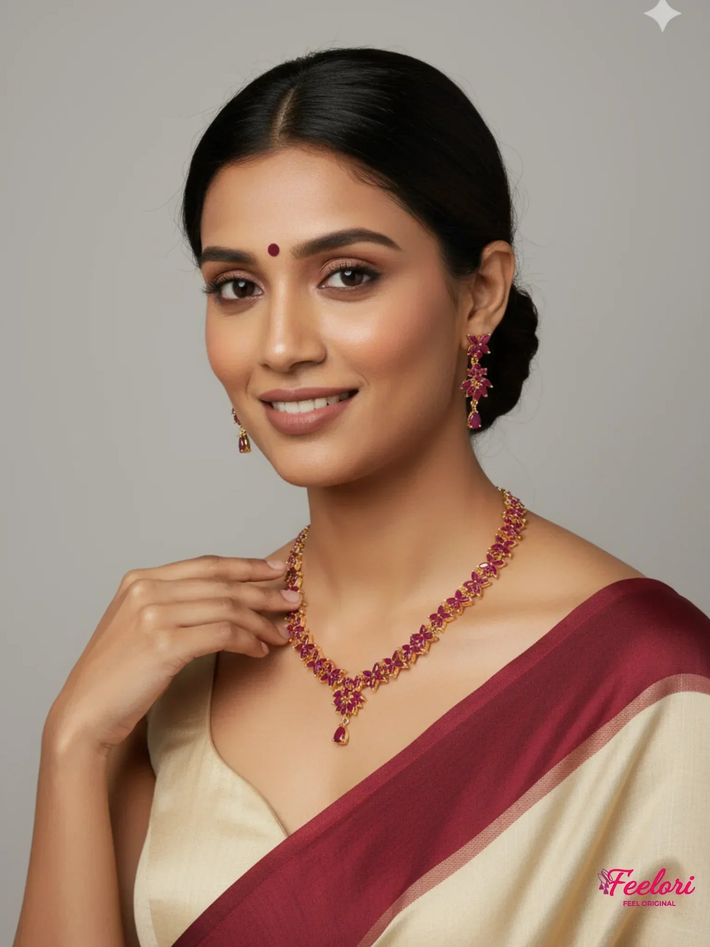 FeelOri Gold Plated Ruby Necklace Set - Model wearing elegant set with traditional saree, smiling.