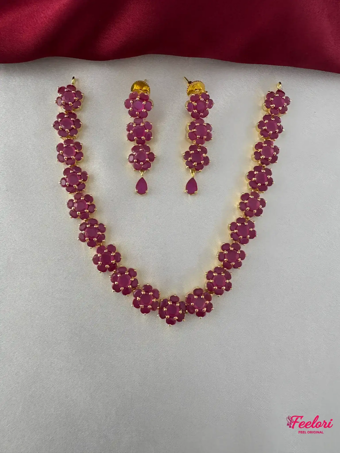 FeelOri Gold Plated Ruby Marquis Blossom Cascade Necklace Set - Full view showcasing the necklace and matching drop earrings on a white background.
