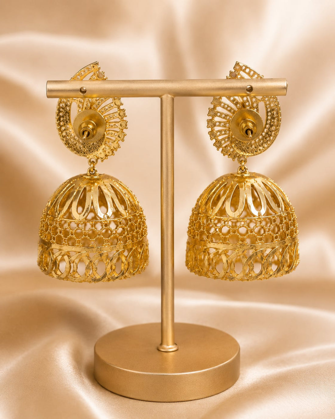 Rear view of FeelOri gold-plated ruby fan CZ jhumka earrings with pearl-look drops showing push-back closures