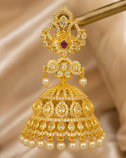 Close-up of tiered CZ dome, ruby accents and pearl-look drop fringe