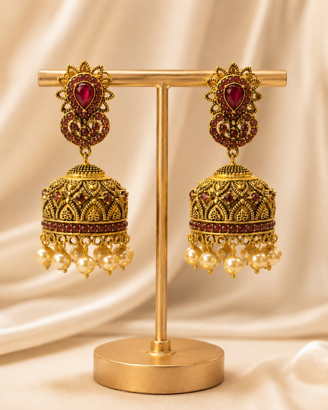FeelOri gold-plated ruby jhumka earrings stone setting, ear-chain or earring construction, and gold-plated finish detail
