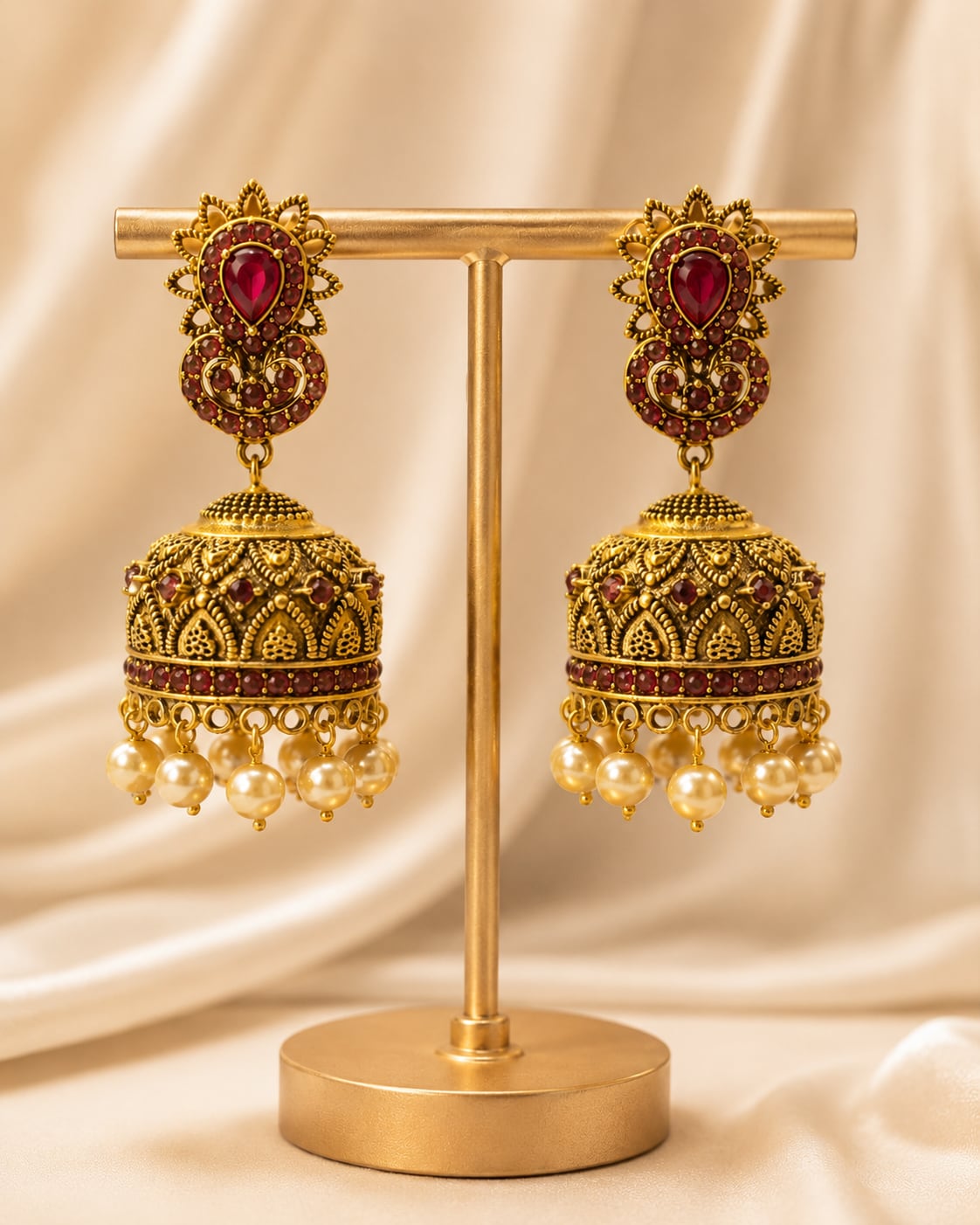 FeelOri gold-plated ruby jhumka earrings stone setting, ear-chain or earring construction, and gold-plated finish detail