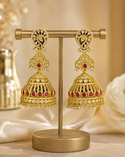 Pair of FeelOri gold-plated long CZ jhumka earrings, front view