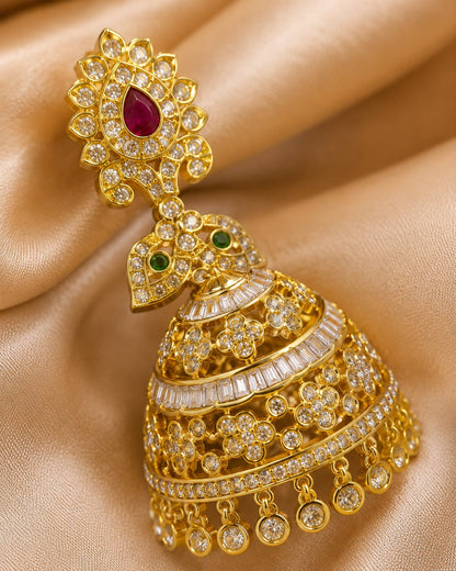Front view of one matching pair of FeelOri gold-plated ruby butterfly CZ jhumka earrings with pearl-look fringe