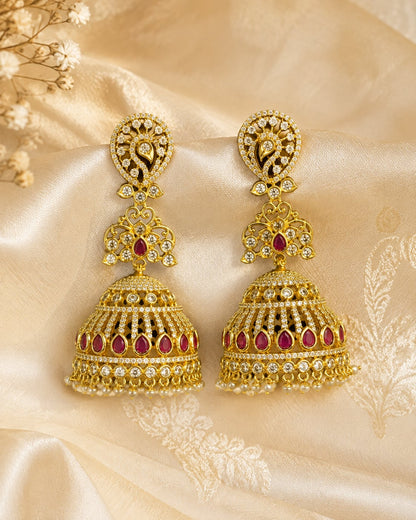 FeelOri ruby CZ long jhumka earrings styled on Indian silk textile