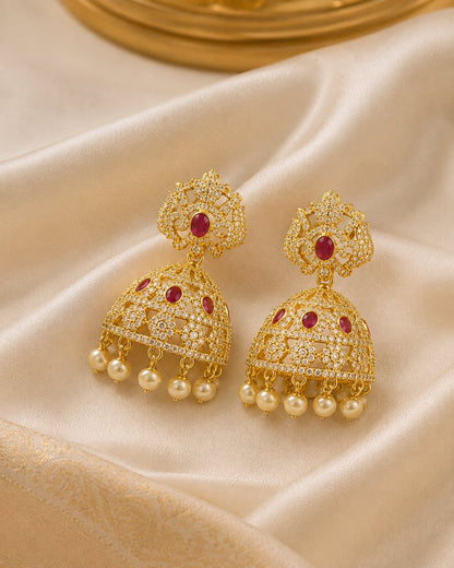 FeelOri gold-plated ruby crown CZ jhumka earrings with pearl-look fringe styled with saree fabric