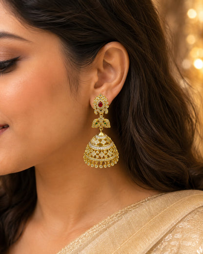 FeelOri gold-plated ruby butterfly CZ jhumka earrings with pearl-look fringe styled with saree fabric