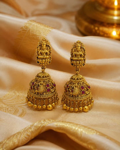 FeelOri gold-plated ruby jhumka earrings styled with saree fabric for Indian occasion wear