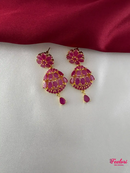 FeelOri Gold Plated Ruby Marquis Petal Cluster Earrings - Close-up view highlighting the floral stud and dangling ruby drop.
