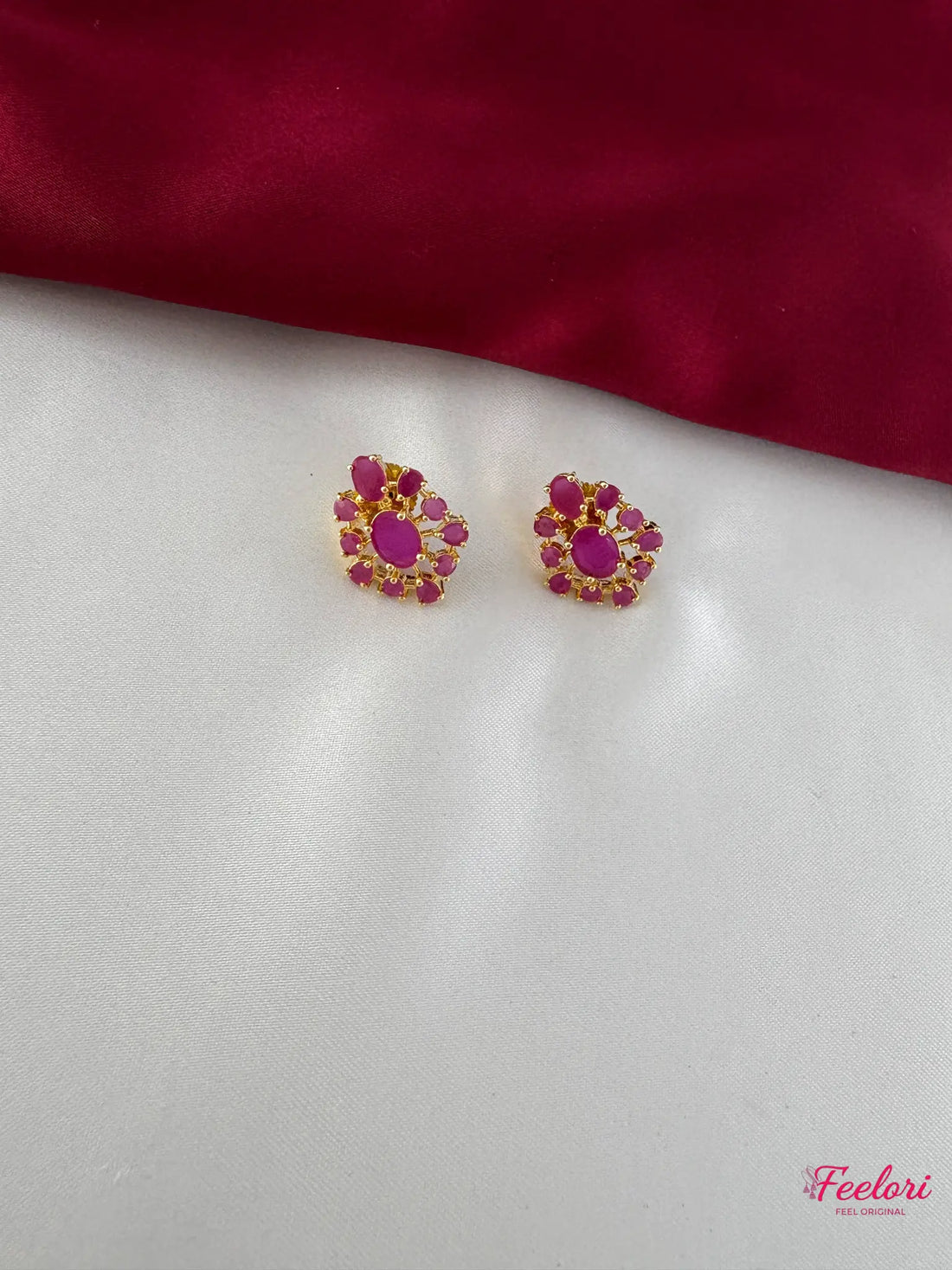 FeelOri Gold Plated Ruby Petal Earrings - Close-up view of the stud earrings, highlighting the intricate petal arrangement and Ruby-Tone CZ-hued stones.