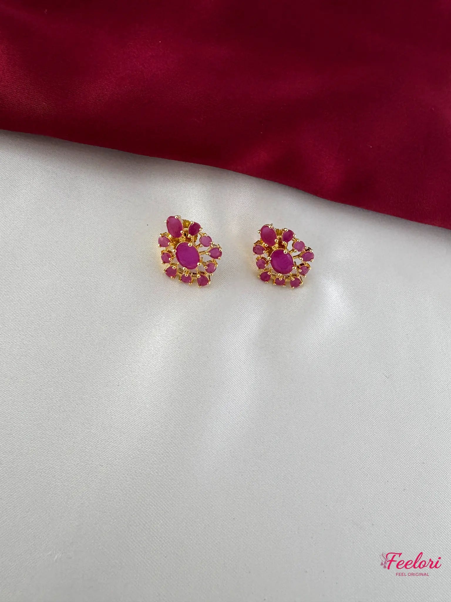 FeelOri Gold Plated Ruby Petal Earrings - Close-up view of the stud earrings, highlighting the intricate petal arrangement and Ruby-Tone CZ-hued stones.
