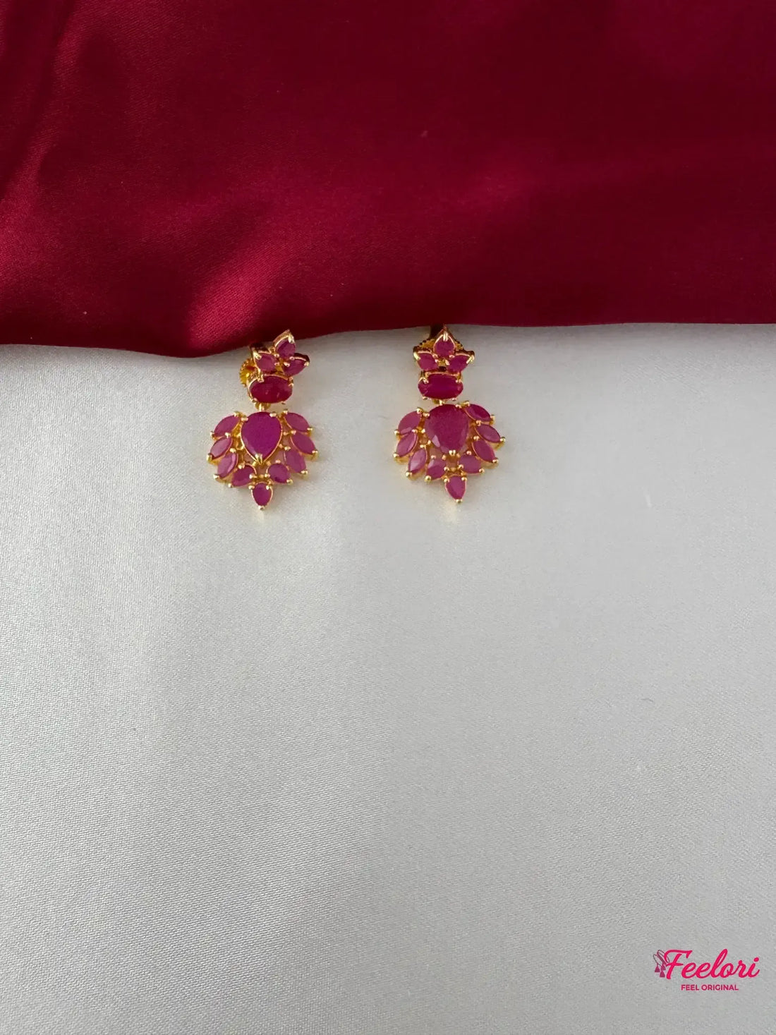 FeelOri Gold Plated Ruby Petal Earrings - Close-up view of the exquisite drop earrings, highlighting the Ruby-Tone CZ-hued stones and intricate petal arrangement.
