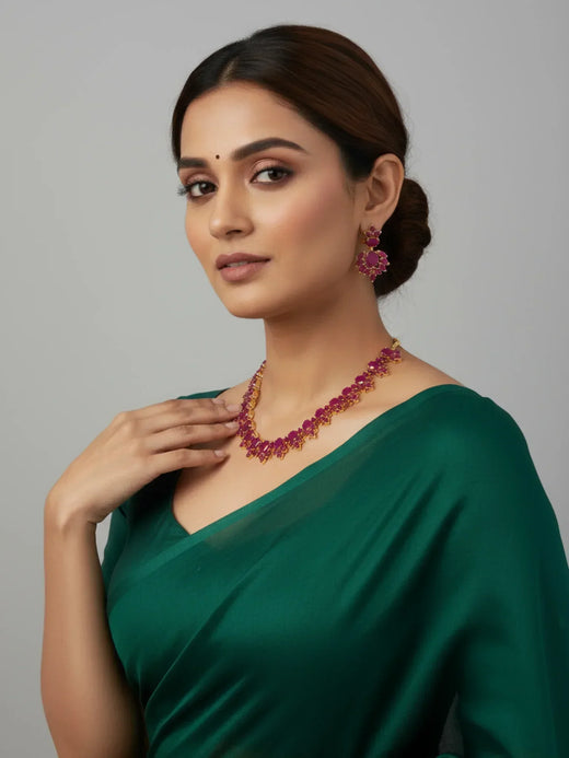 FeelOri Gold Plated Ruby Petal Necklace Set - Model wearing set with green saree, showcasing festive charm.