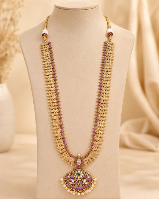 FeelOri gold-polished long haram necklace on jewellery display