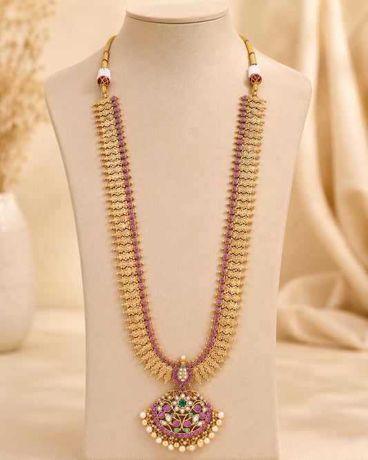 FeelOri gold-polished long haram necklace on jewellery display