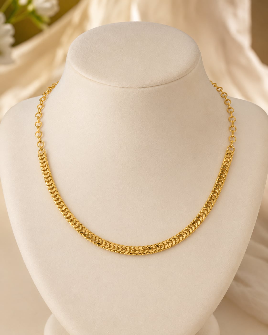 FeelOri gold-polished necklace on jewellery display